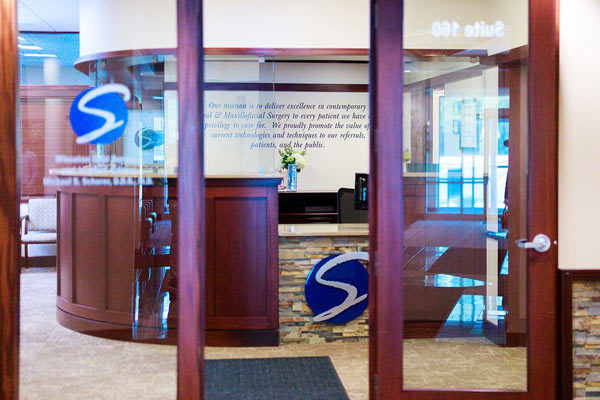 Entryway and front desk at Wheaton Oral Surgery in Naperville IL 